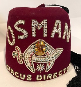 lot 111 image: Vintage Osman Circus Director Tasseled Cap with Case