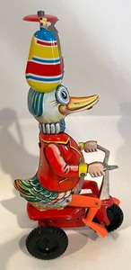 lot 118 image: Vintage and Replica Wind Up Toys