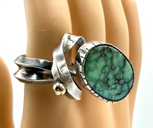 lot 133 image: Uniquely Designed Artisan Created Sterling and Turquoise Ring with a 14k Accent
