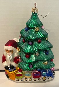 lot 304 image: Three Christopher Radko Ornaments including Christopher Radko Jolly Wrap & Christopher Radko Nigh Time Flight