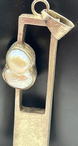 lot 217 image: Sterling and Pearl Pendant by Balaam