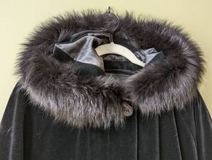 lot 282 image: Burberry Black Velvet Fur Trimmed Hooded Coat