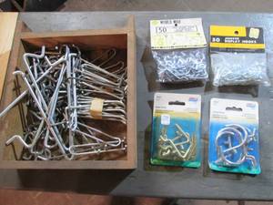 Box of pegboard hooks and displays...