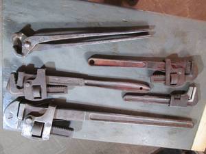 Lot of wrenches and a clipper...