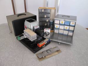 Slide projector in case with empty ...