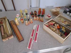 Taper candles and vintage wax figur...