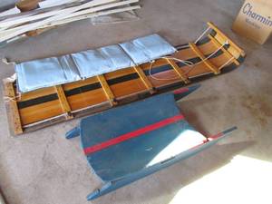 Full size toboggan and a wood sled...