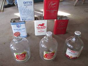 Vintage fluid cans and glass jugs...