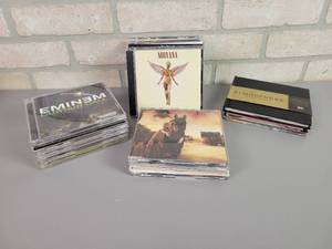 lot 536 image: Large Lot of Music CDs - Nirvana, Red Hot Chili Peppers, PINK, Eminem and More