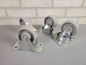 lot 559 image: (4) New FAIRBANKS Steel Wheel 3 Casters - (2) Straight and (2) Swivel