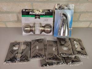 lot 643 image: NEW Kwikset Hall & Closet Brushed Nickel Door Knob Set, Chrome Tub Spout and Assorted Switch Plates