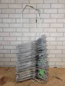 lot 693 image: MANY Wire Coat Hangers on rack - NO SHIPPING