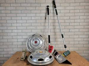lot 724 image: (2) Vintage 16 Hubcaps, Hitch Cover, Jack and (2) Garden Hose Scrub Brushes - NO SHIPPING