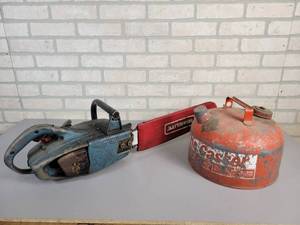 lot 769 image: Vintage HOMELITE 150 Automatic Chainsaw (Motor Pulls Over) and 2.5 Gallon Steel Gas Can - NO SHIPPING