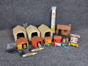 lot 222 image: Lot of Vintage Mattel Structures, a Pair of Aurora Slot Car Controllers, Misc. Railroad Props, Vehicles, and More