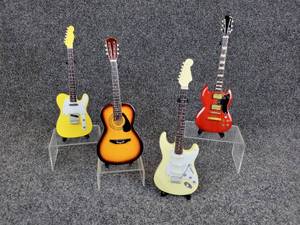 lot 226 image: Lot of (4) Miniature Guitars on Stands