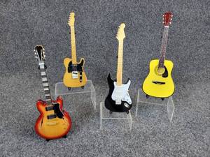 lot 254 image: Lot of (4) Miniature Electric & Acoustic Guitars on Stands