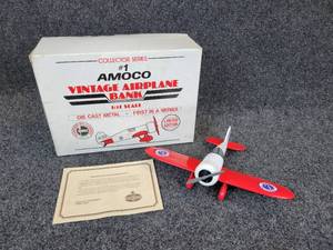 lot 270 image: Die Cast Amoco Vintage Airplane Coin Bank