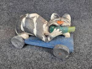 lot 288 image: Hand Carved Indonesian Wood Cat and Fish Sculpture on Wheels
