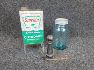 lot 300 image: Sinclair Extra Duty Outboard Motor Oil - Full Can, Ball Mason Jar with Zinc Cap, and Cast Iron Doorstop