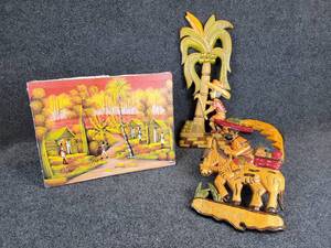 lot 348 image: Pair of Jamaican Carved Wall Hangings and a 16 x 12 Painted Canvas