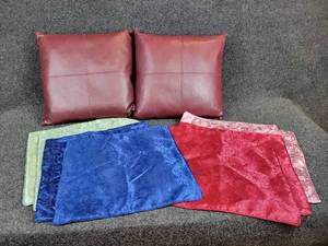 lot 377 image: Pair of Leather Throw Pillows with (4) Sets of Pillow Covers