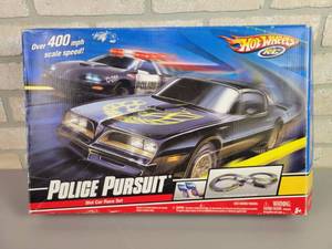 lot 28 image: HOT WHEELS Police Pursuit Slot Car Race Set - Includes Police Car and the Bandit