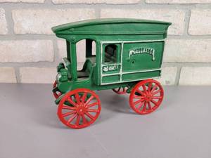 lot 46 image: Cast Iron McCallaster Horseless Carriage Toy