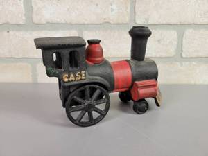 lot 47 image: Cast Iron CASE Steam Engine Toy