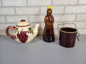 lot 399 image: Glass Mrs. Butterworth Bottle, Small Crock and Teapot