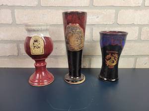 lot 2225 image: (3) Minnesota Renaissance Festival Pottery Cups - 2003, 2005 & 2006