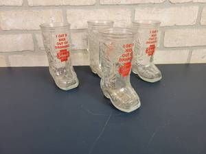 lot 2227 image: Lot of (4) I Get a Kick out of Drinking SCHMIDT Glass Boot Mugs