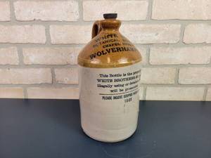 lot 2231 image: 1931 Stoneware Flagon  Jug White Bros. Botanical Brewers Chapel Street Wolverhampton, England - Includes Original Stopper