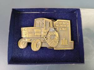 lot 2264 image: Vintage International Belt Buckle - Produced by SpecCast