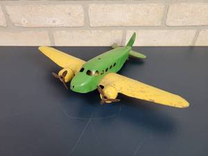 lot 2302 image: Antique WYANDOTTE Pressed Steel Airplane Toy
