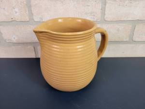 lot 2427 image: Vintage MONMOUTH Pottery Ribbed Caramel Pitcher
