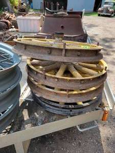 lot 126 image: (4) FORD Model T Wood Spoke Wheels