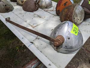 lot 203 image: Antique Car Headlight with Unusual Bent Lens