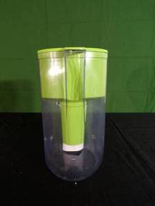 lot 125 image: Water Filter with New Filter (Appears to be Missing Lid Cover)