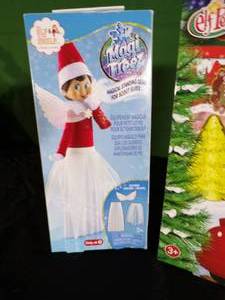 lot 291 image: Brand New NorthPole Advent Train and Magical Elf on the Shelf Standing Gear
