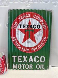 lot 98 image: Texaco Corrugated Metal Sign