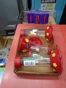 Flat of hummingbird feeders. As shown.