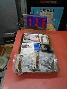 Flat of gate latches & smoke alarms. As shown.