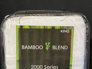lot 23 image: Bamboo White King Sheet Set (8)
