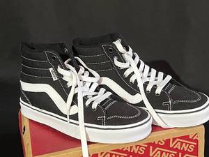 lot 32 image: New Womens Black High-Top Vans and Vintage Shoe Beats