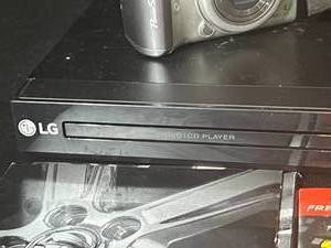 lot 60 image: LG DVDCD Player, Canon Powershot A520 & Movies