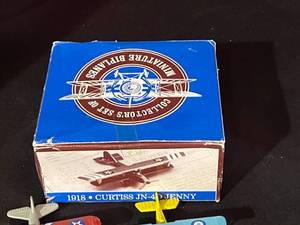 lot 102 image: Collectors Set of Classic Trucks and Miniature Biplanes