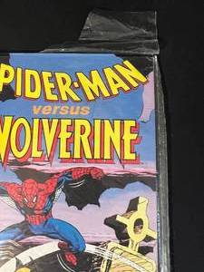 lot 119 image: Spider-Man versus Wolverine Comic