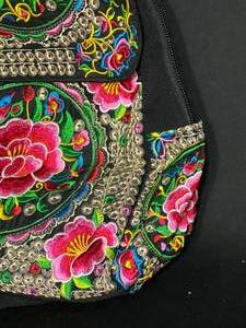 lot 155 image: Beautiful Multi colored Floral Sewn Backpack