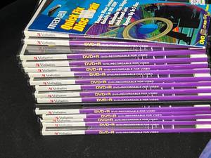 lot 176 image: DVD Cases, Labeling System, cords